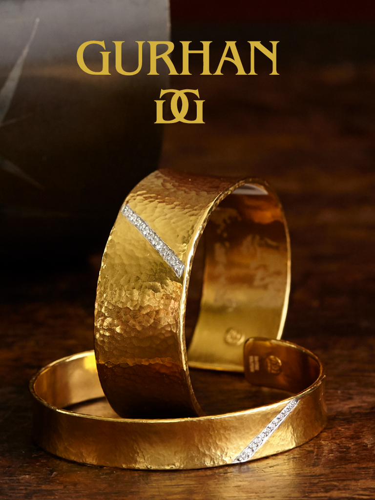 Golden Gurhan Ring and Bangles on a dark gold background
